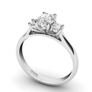 Oval Cut Diamond rilogy engagement ring with round cut outside diamonds