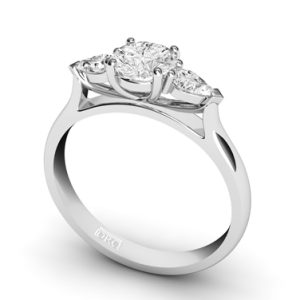 Round Cut Diamond rilogy engagement ring with pear cut outside diamondsa