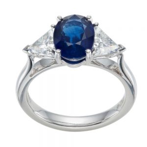 Sapphire Trilogy Engagement Ring with Trilliant cut diamond
