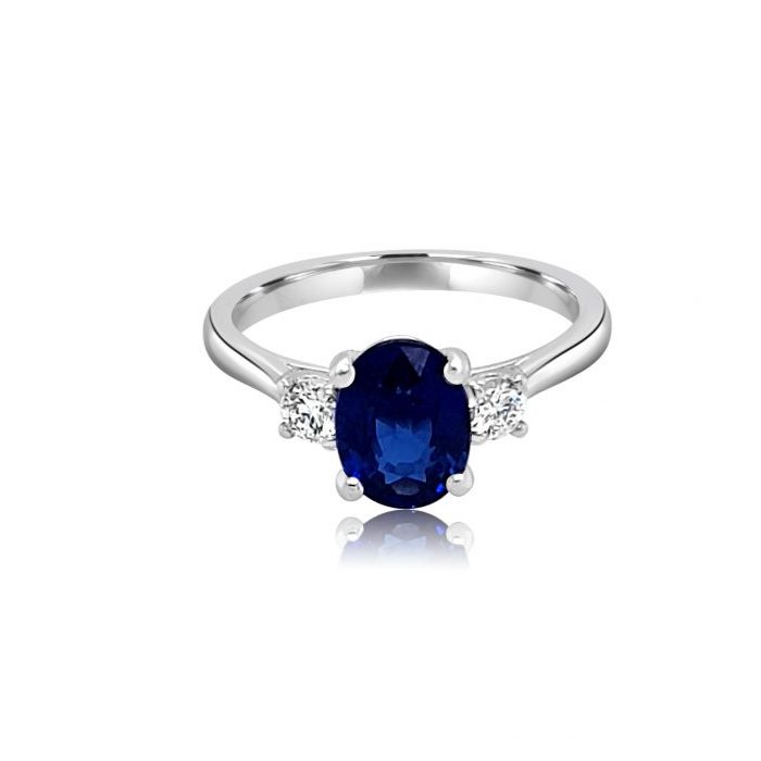 Untreated oval sapphire engagement ring