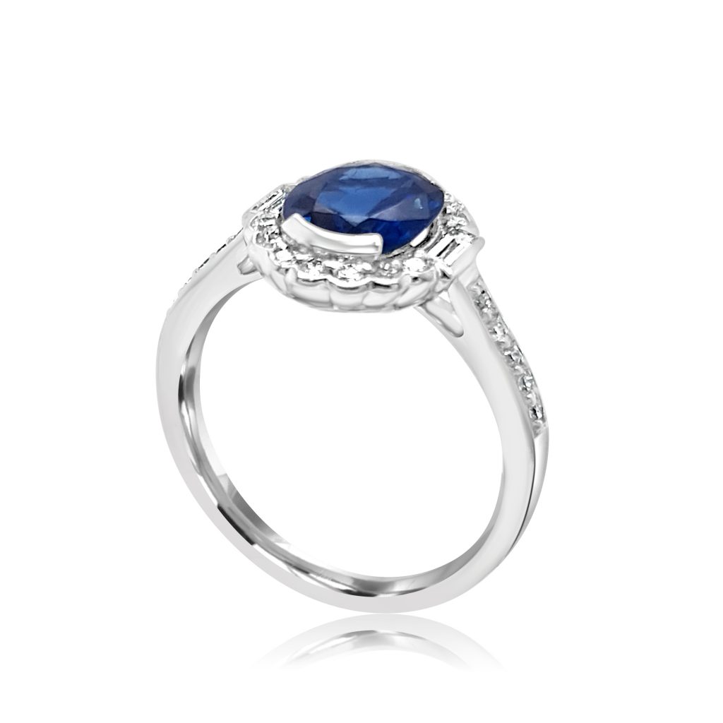 Oval Sapphire with brillinat cut and baguette halo engagement ring