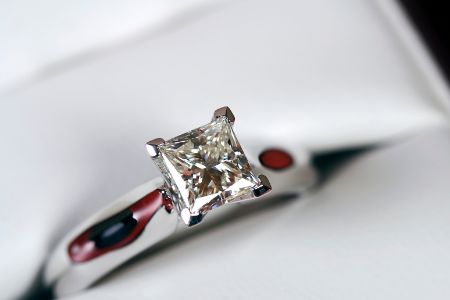 Princess cut diamond by set in a platinum band by the diamond ring comapny Princess cut diamond by set in a platinum band by the diamond ring comapny