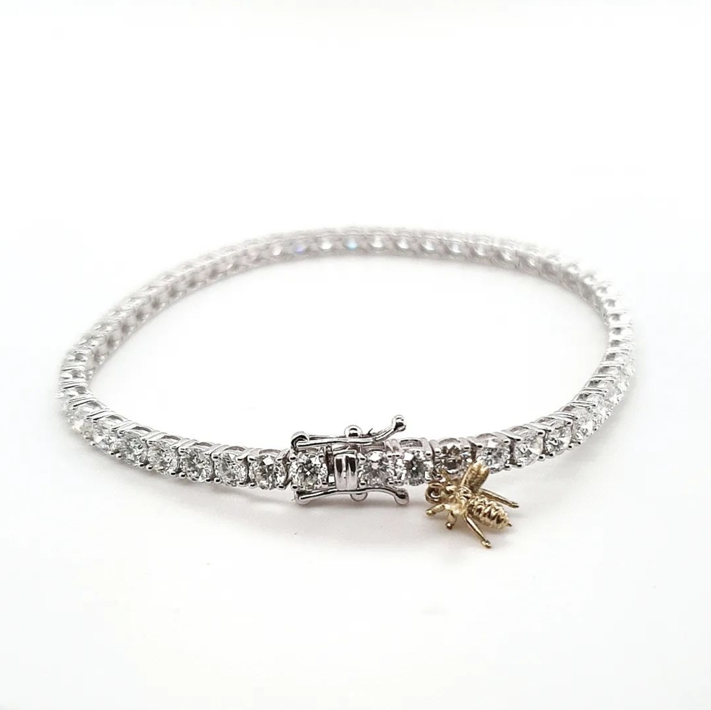 Little Yellow Gold Bumble Bee attached to a Tennis bracelet
