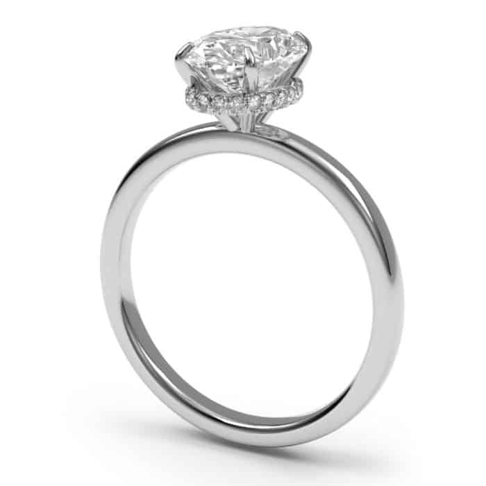 Oval cut hidden halo diamond engagement ring in platinum