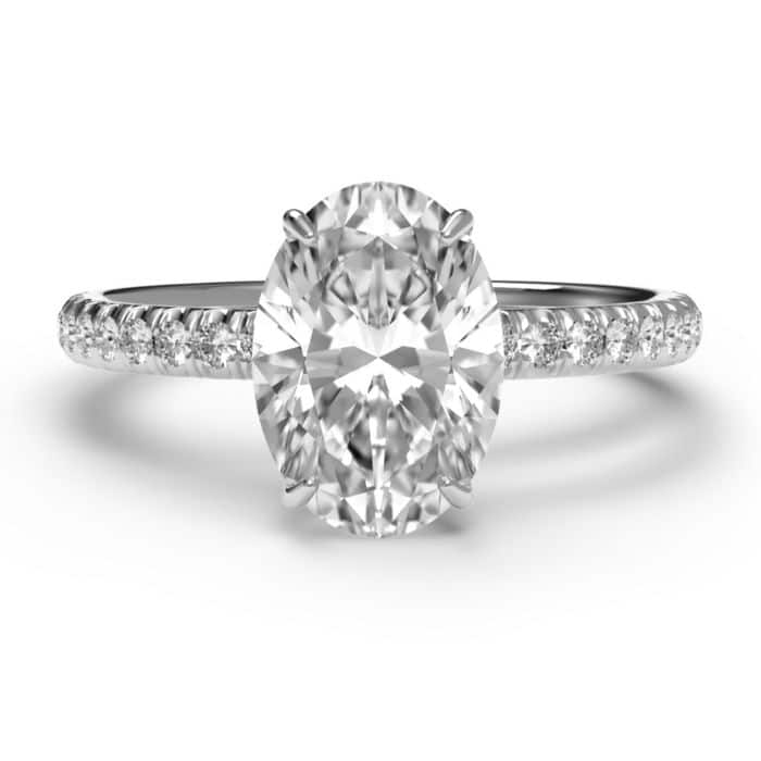 Oval cut hidden halo diamond microset pave engagement ring in platinum - birds eye view