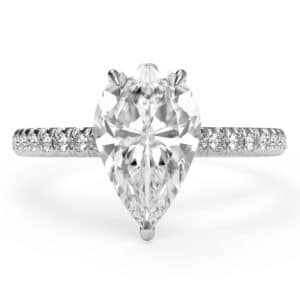 birds eye view of a pear cut diamond shoulder engagement ring in platinum