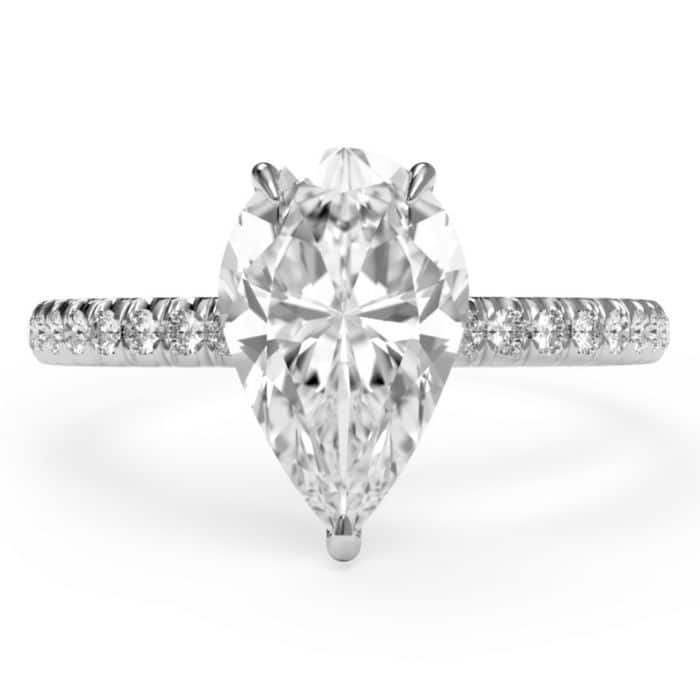 Pear cut hidden halo diamond microset pave engagement ring in platinum - top view