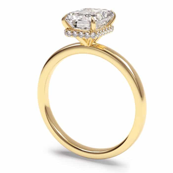 Radiant cut hidden halo diamond engagement ring in yellow gold