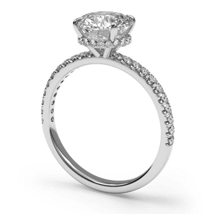 Round brilliant cut hidden halo diamond microset pave engagement ring in platinum