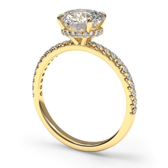 Round brilliant cut hidden halo diamond microset pave engagement ring in yellow gold