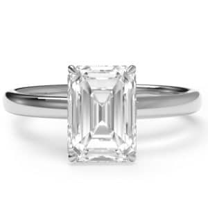 Top view Platinum diamond hidden halo engagement ring with with an emerald cut centre stone