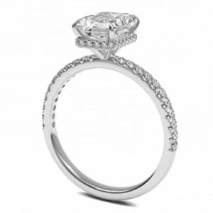 Emerald cut diamond ring set in a platinum hidden halo ring setting