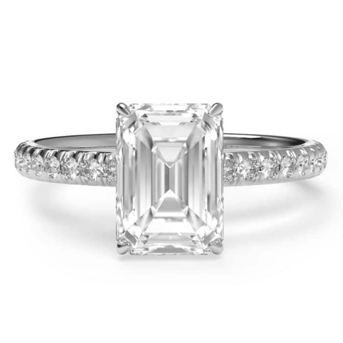 Top view of an Emerald cut diamond ring set in a platinum hidden halo ring setting