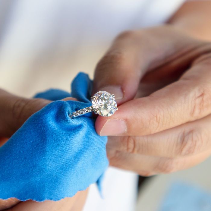 Picture of a man cleaning a ring