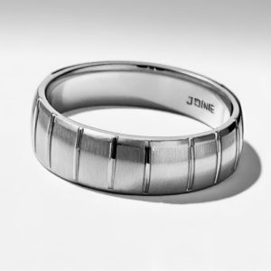 Mens platinum striped wedding band with brushed finish in platinum