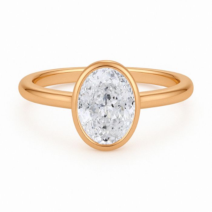 Bezel set diamond engagement ring with a oval brilliant cut diamond in rose gold