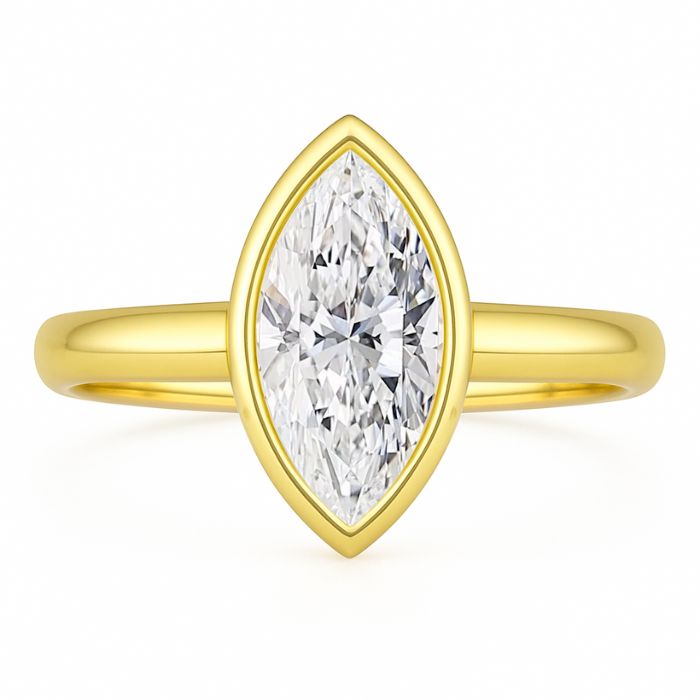 Bezel set diamond engagement ring with marquise diamond in yellow gold